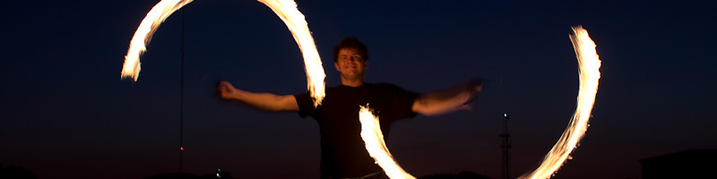 Sunset Fire Spinning by JT Booth
